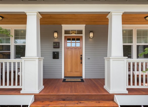 Covered porch and front door of beautiful new home